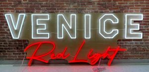 Venice Red Light custom neon sign made for Burning Man event (extreme dust and rain)